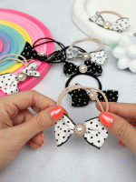 کش مو پاپیونی در دو رنگ سفید و مشکی